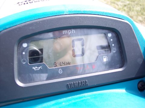 1996 Yamaha RA760 WaveRaider 2-P - Digital display on a Yamaha jet ski shows 0 mph and 34.4 hours of operation.