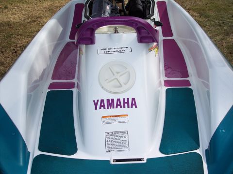 1996 Yamaha RA760 WaveRaider 2-P - Interior view of a Yamaha jet ski, showing the seating area and control console.