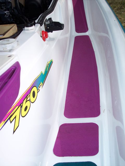 1996 Yamaha RA760 WaveRaider 2-P - Close-up of a jet ski's interior, showing purple traction pads and a '760' graphic.