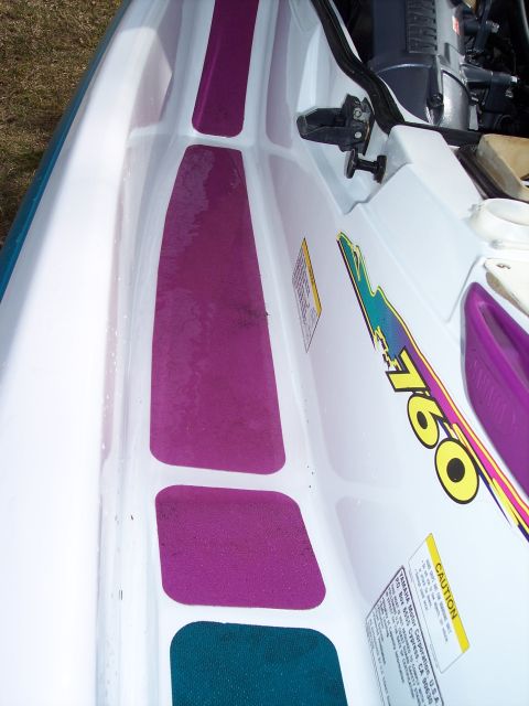 1996 Yamaha RA760 WaveRaider 2-P - Interior view of a 1996 Yamaha RA760 WaveRaider 2-P jet ski, purple padding and a prominent '760' decal.