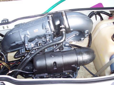 1996 Yamaha RA760 WaveRaider 2-P - Close-up view of a Yamaha jet ski engine, highlighting the intake manifold and associated plumbing.