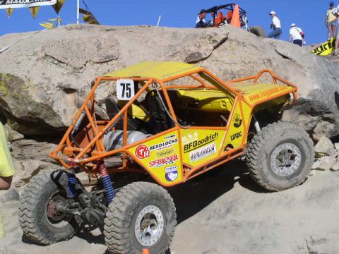 1979 Ford Bronco - A custom-built off-road buggy navigates a challenging rocky course.