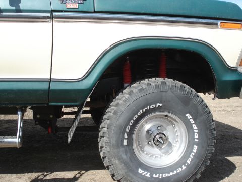 1979 Ford Bronco - This truck features a two-tone paint scheme with green and white sections, and BFGoodrich tires.