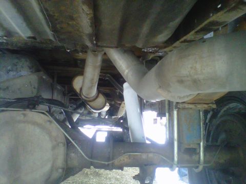 1994 Ford F-150 - Underside view of a 1994 Ford F-150, highlighting the rear axle and exhaust components.