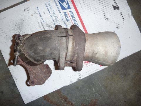 1997 Dodge 2500 - Exhaust manifold and catalytic converter assembly shown on a shipping box.