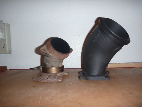1997 Dodge 2500 - Comparison of a used exhaust pipe and a new replacement part.