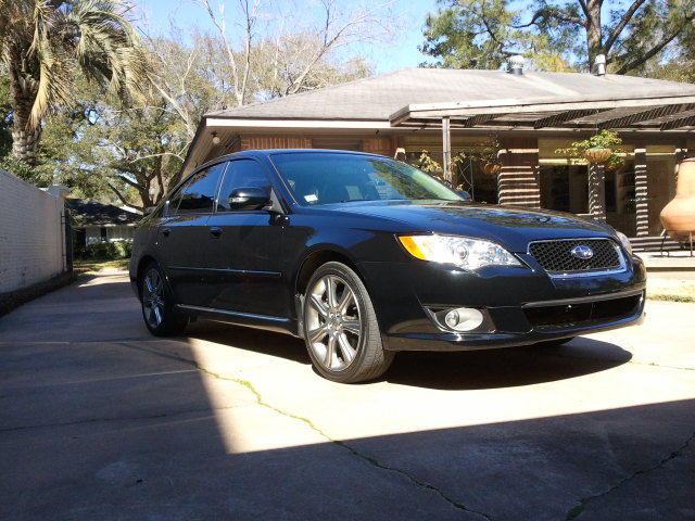 Black 2008 Subaru Legacy sedan, front 3/4 view