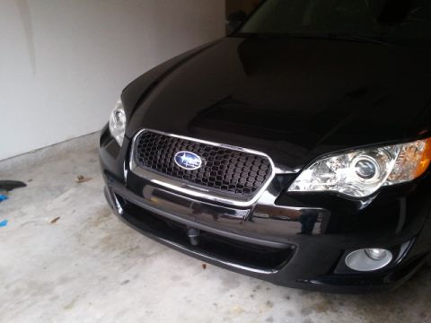 2008 Subaru Legacy - The grille design and headlights suggest this Subaru Legacy is from the 2005-2006 model years, not 2008.