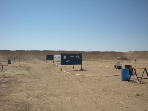 1996 Ford Bronco - Outdoor shooting range with targets set up for practice.