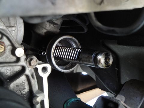 2003 Ford Taurus - Steering rack pinion shaft detail, showing the splined shaft and threaded end.