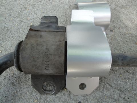 2003 Ford Taurus - Comparison of a worn sway bar bushing with a new replacement part.