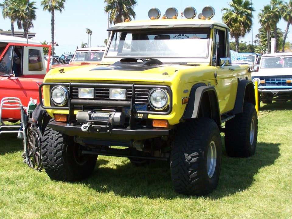 Yellow 1978 Ford Bronco with winch and roof lights