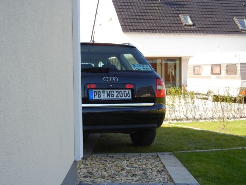 2003 Audi A6 - Rear view of a dark Audi wagon, license plate reads PB WG 2006.