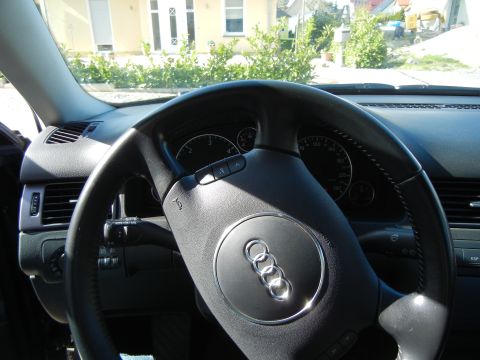 2003 Audi A6 - Interior view of a 2003 Audi A6, focusing on the steering wheel and instrument cluster.