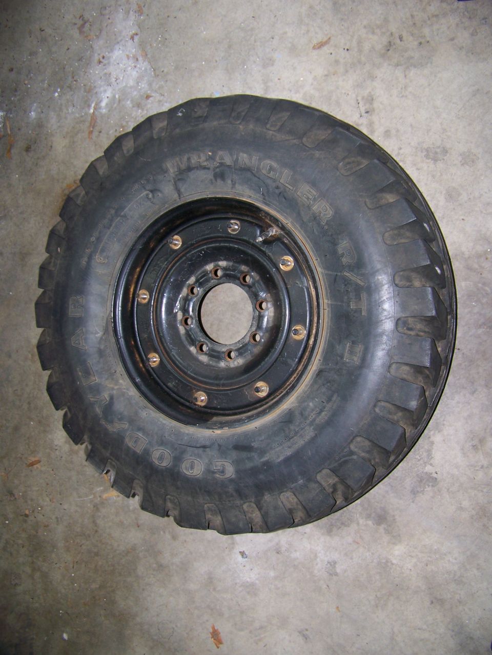 Goodyear Wrangler tire on black wheel