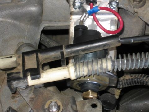 1995 Ford Bronco - Engine component with wiring, possibly part of an onboard air system.