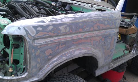 1995 Ford Bronco - This 1995 Ford Bronco fender is undergoing bodywork, revealing the engine bay.