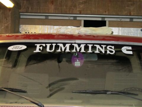1984 Ford Bronco - Windshield of a 1984 Ford Bronco custom 'Ford' and 'Cummins' decals.