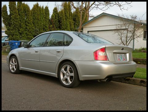 2006 Subaru Legacy - This silver 2006 Subaru Legacy sedan is seen from the rear, parked on a residential street.