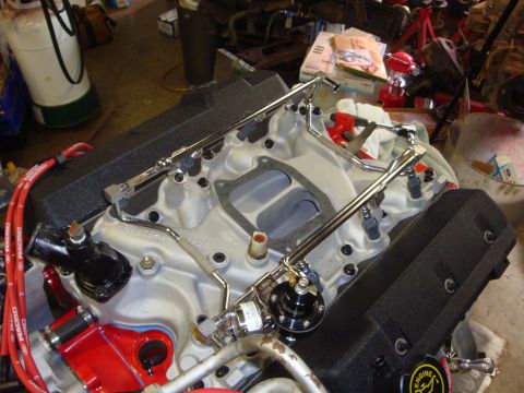 1989 Ford Bronco - Close-up view of an engine assembly, likely undergoing maintenance or modification.