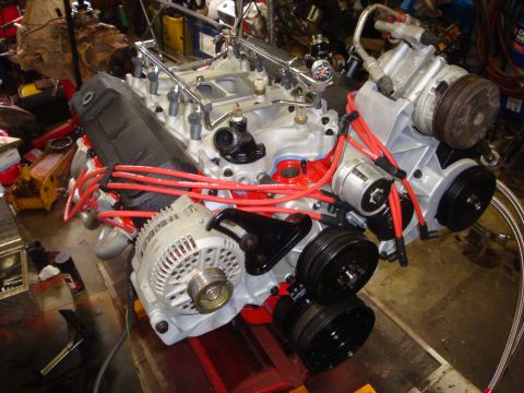1989 Ford Bronco - A Ford V8 engine assembly is shown with various components attached, including an alternator and air conditioning compressor.