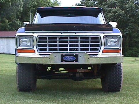 1978 Ford Bronco - Frontal view of a 1978 Ford Bronco with a chrome grille and bumper.