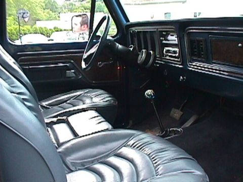 1978 Ford Bronco - Interior view of a 1978 Ford Bronco, highlighting its dashboard and seating.