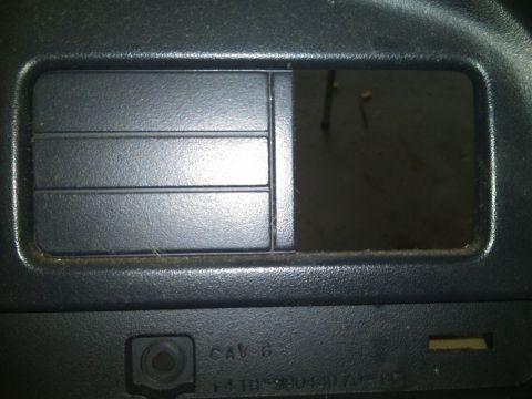 1993 Ford Bronco - Close-up of a vehicle's interior vent, showing its design and some visible text on the dashboard.