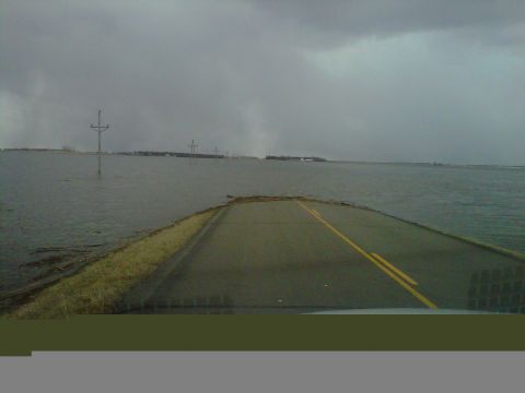 2011 Ford 427 - The road ahead is completely underwater, making travel impossible.