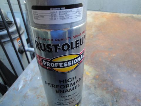 2003 Ford Taurus - A can of Rust-Oleum Professional High Performance Enamel is shown, with text detailing its contents and features.