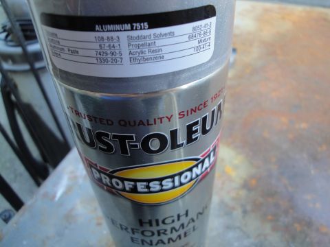 2003 Ford Taurus - A can of Rust-Oleum Professional High Performance Enamel spray paint is shown, with its ingredients and product information clearly visible.