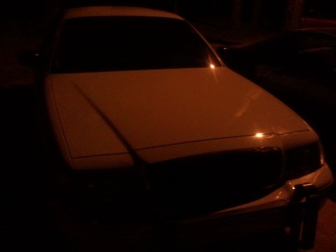 1998 Ford Crown Victoria - underr the light pole