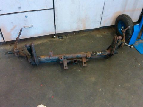 1995 Ford F-150 - This is a front suspension crossmember, likely from an older vehicle.