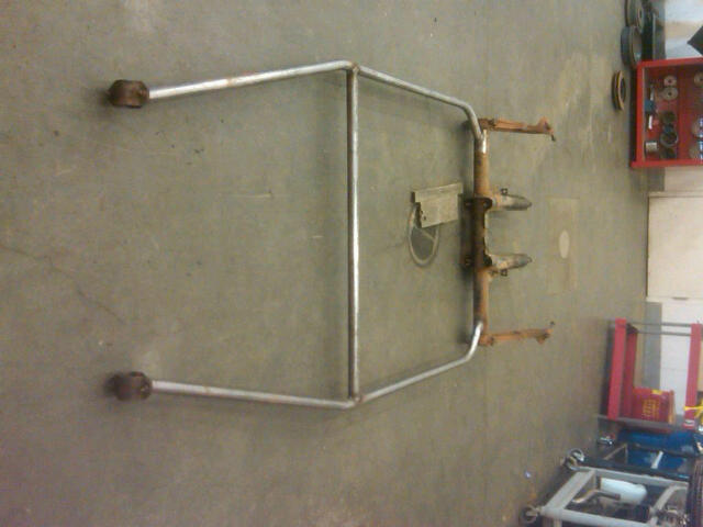 Metal frame with rubber ends on a concrete floor
