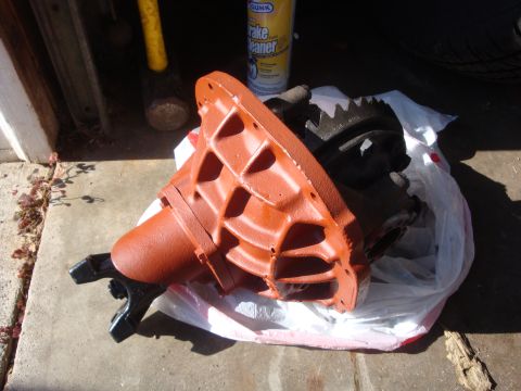 1964 Ford Fairlane - A differential housing and gears are shown, possibly for a vehicle restoration project.