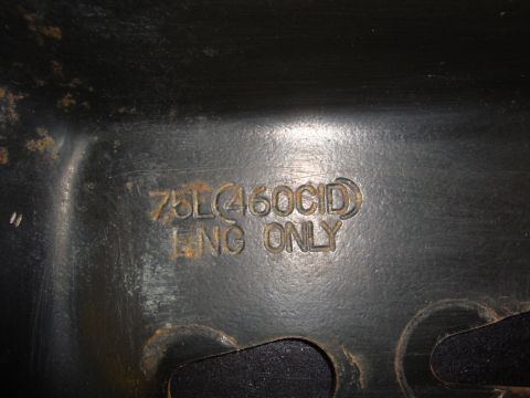 1989 Ford Bronco - Close-up of a stamped metal part indicating it is for a 460 CID engine.