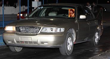 2000 Mercury Grand Marquis - This 2000 Mercury Grand Marquis is equipped with racing slicks and appears to be on a drag strip.