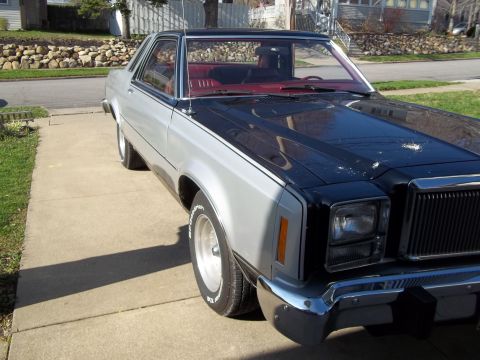 1970 Ford Ranchero - This Ford Ranchero pickup truck has a two-tone paint scheme with silver and black.
