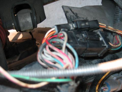 1992 Ford Bronco - Wiring harness connectors with various colored wires visible in engine bay.