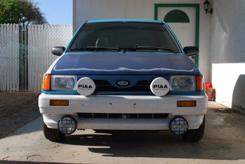 1991 Ford Festiva - Front view of a 1991 Ford Festiva, equipped with PIAA driving lights.