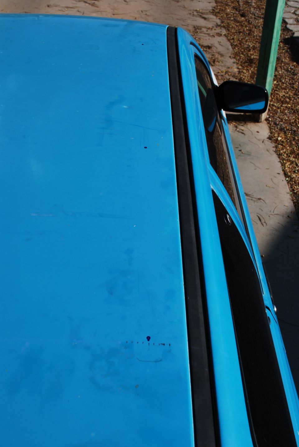 Blue car roof and side window