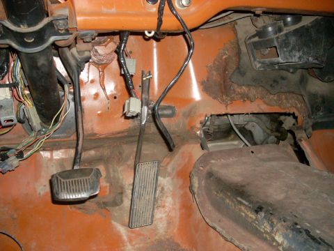 1992 Ford Ranger - Vehicle interior floor with pedals and wiring, showing signs of rust and wear.