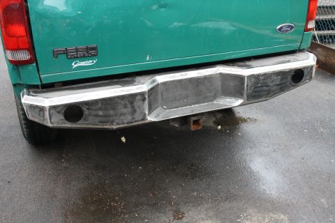 2003 Ford F-250 - Rear view of a green Ford F-250 Super Duty truck with a custom bumper.
