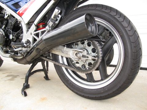 1984 Honda Interceptor - Rear view of a 1984 Honda Interceptor, highlighting its wheel, chain, and exhaust system.