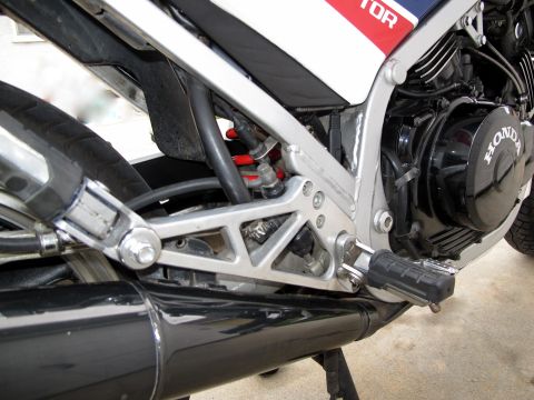 1984 Honda Interceptor - Close-up view of a 1984 Honda Interceptor's engine and exhaust components.