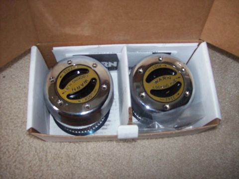 1982 Ford F-100 - Pair of Warn locking hubs shown in their original packaging.