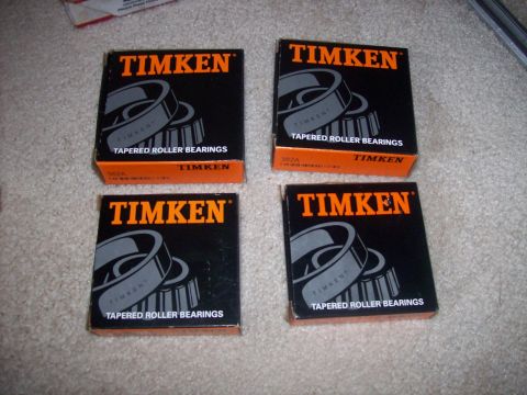 1982 Ford F-100 - Four boxes of Timken tapered roller bearings are displayed on a carpeted floor.