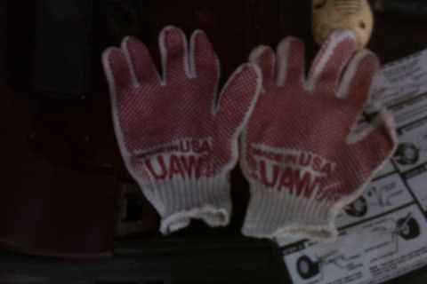 1994 Chevrolet Blazer - Red work gloves with "MADE IN USA UAW" text are laid out on a surface.