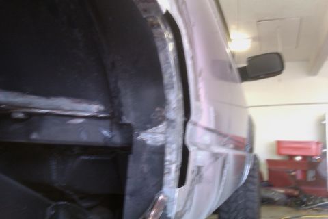 1994 Chevrolet Blazer - This 1994 Chevrolet Blazer shows extensive rust repair work in the rear wheel well area.