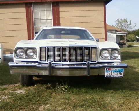 1976 Ford Torino - This 1976 Ford Torino is seen from the front, a prominent grille and dual headlights, with a Texas license plate.
